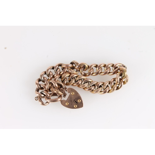 599 - 9ct gold fancy curb link charm bracelet with padlock clasp, 19.8g.