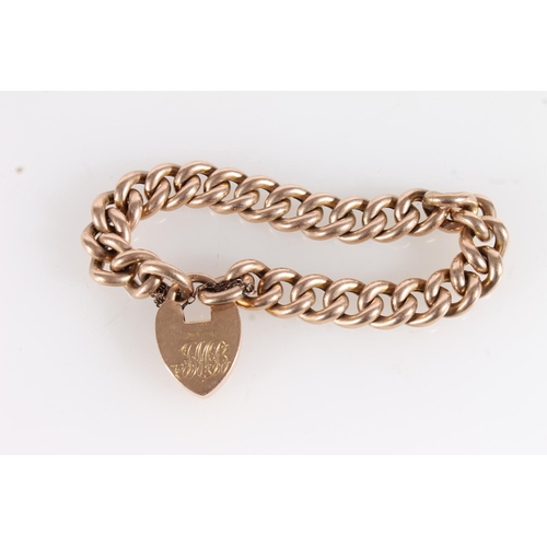 600 - 15ct gold curb link bracelet with 15ct gold padlock clasp, 28.5g.