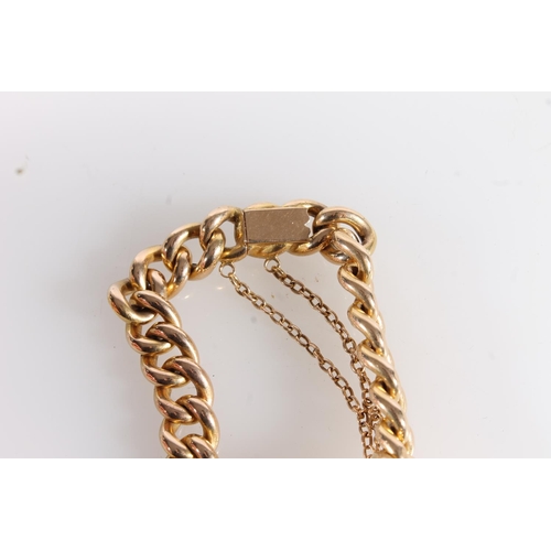 601 - 18ct gold curb link bracelet set with non-marked yellow metal and flower head centre, gross 25g.