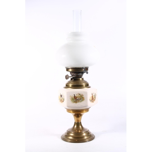 34 - Oil lamp with ceramic hunting type decoration to reservoir, 56cm high.