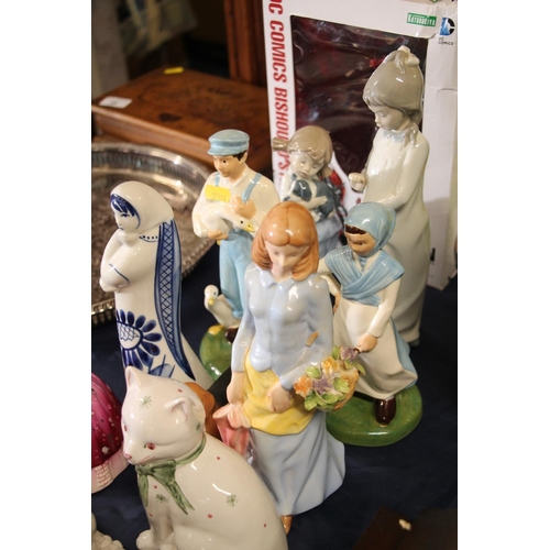 38 - Ceramic and wooden figurines to include Nao, Coalport, etc.