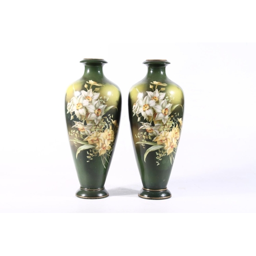 39 - Pair of continental green vases, 31cm high.