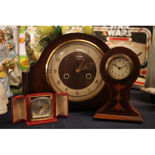 40 - Smiths Enfield mantel clock, a small Art Nouveau clock and a travelling clock.  (3)