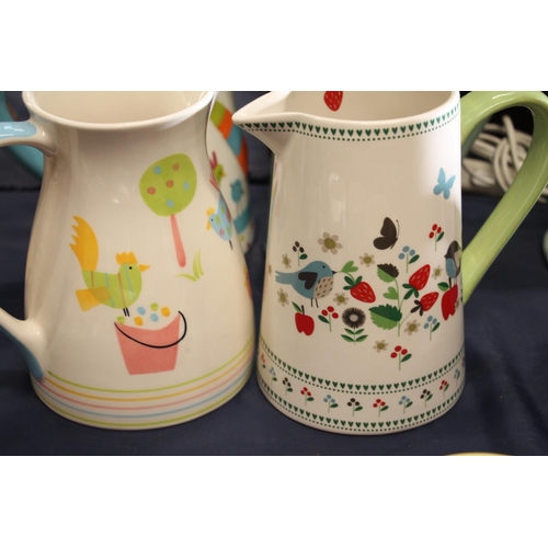 60 - Large Denby Green Manor jug, a Gisela Graham pitcher, Marks & Spencer chicken decorated jugs, an... 