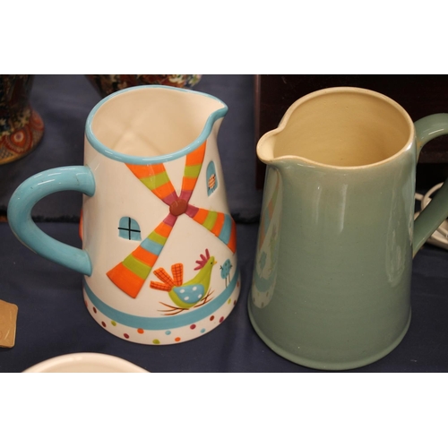 60 - Large Denby Green Manor jug, a Gisela Graham pitcher, Marks & Spencer chicken decorated jugs, an... 