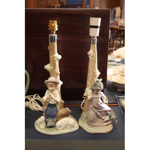 61 - Two Nao porcelain figural table lamps, 35cm high.