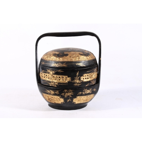 66 - Chinese black lacquer and gilt wedding basket, 19cm high.