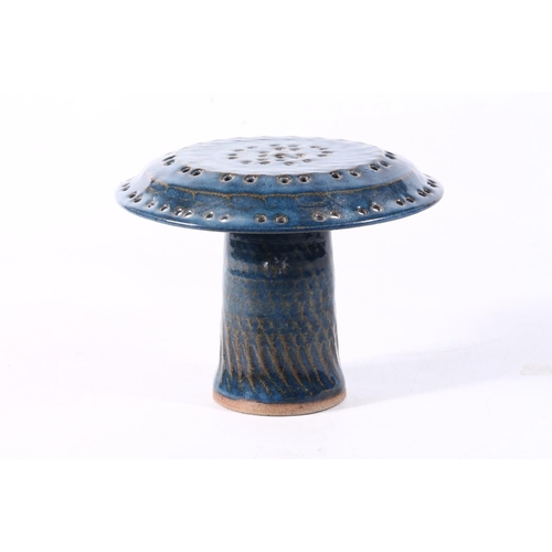 68 - Studio Pottery blue glazed mushroom, 12cm high.