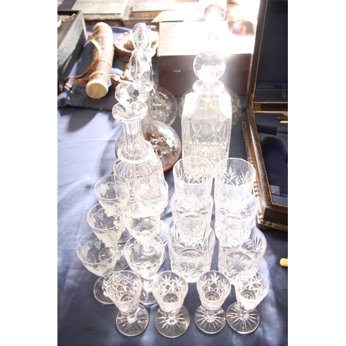 69 - Five glass decanters, glass beakers, port glasses, etc.