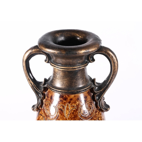 103 - Tortoiseshell coloured glazed Etruscan style vase, 37cm high.