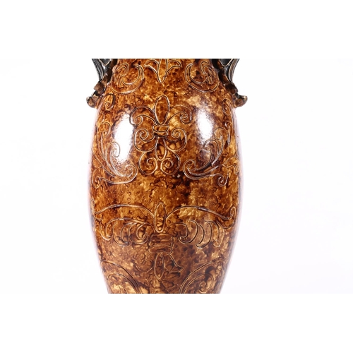 103 - Tortoiseshell coloured glazed Etruscan style vase, 37cm high.