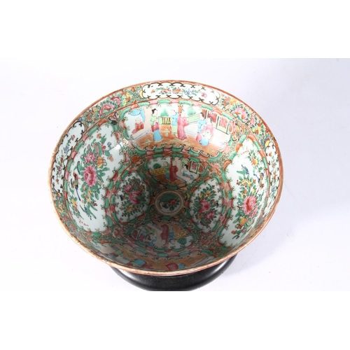 118 - 20th century Chinese famille rose porcelain bowl on hardwood base, 28cm wide.