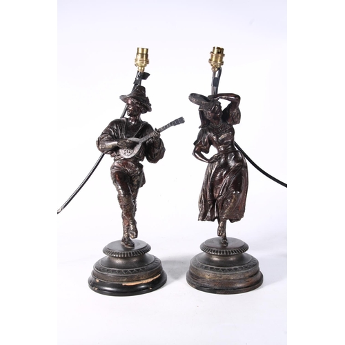 128 - Pair of spelter figural table lamp bases, 49.5cm high.