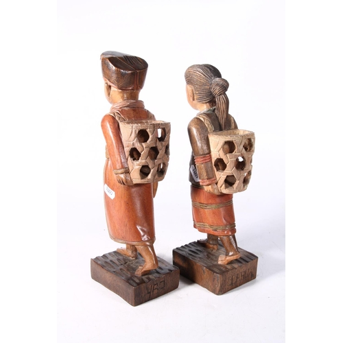 161 - Two Southeast Asian carved figurines.