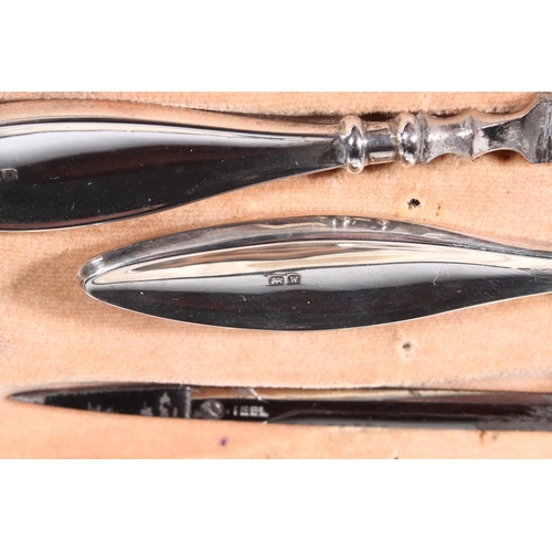 218 - Silver manicure set.