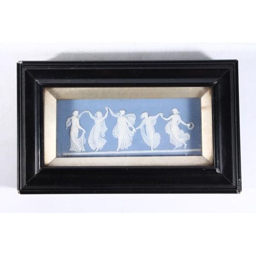 232 - Wedgwood Jasperware plaque decorated with dancing graces in ebonised frame, 22cm.