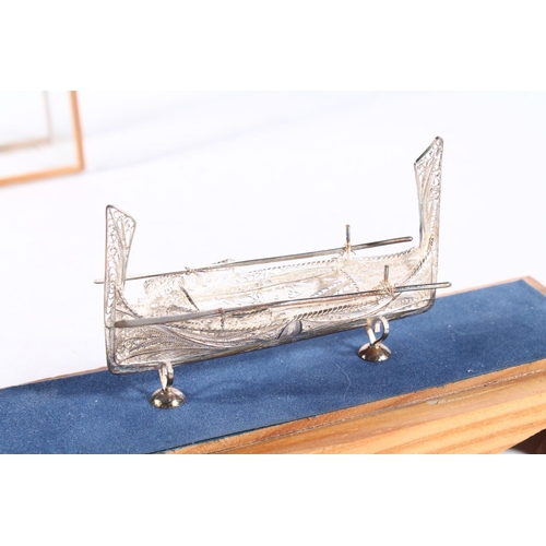 235 - Filigree model of a boat, in case.