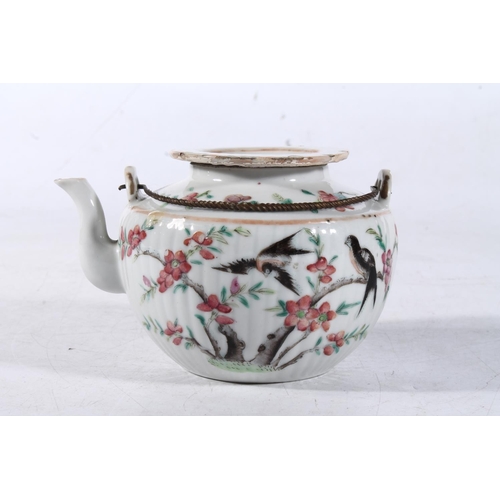 248 - Chinese teapot decorated in polychrome enamels with florals.