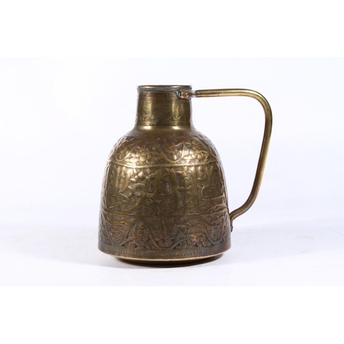 263 - North African/Middle Eastern brass jug, 17cm high.