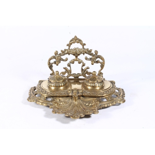 264 - Ornate brass inkstand, 22cm wide.