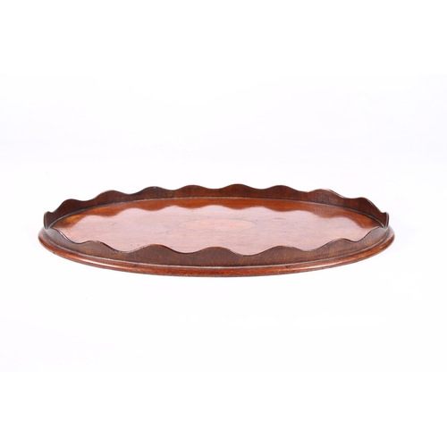 94 - Edwardian oval mahogany letter tray, 9cm wide.