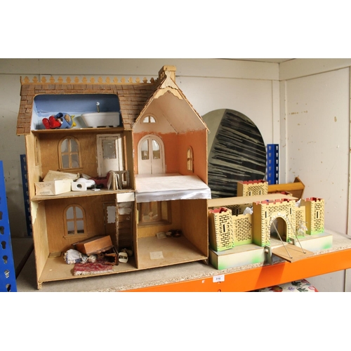 316 - Open fronted dolls house, castle with draw bridge, accessories, etc.