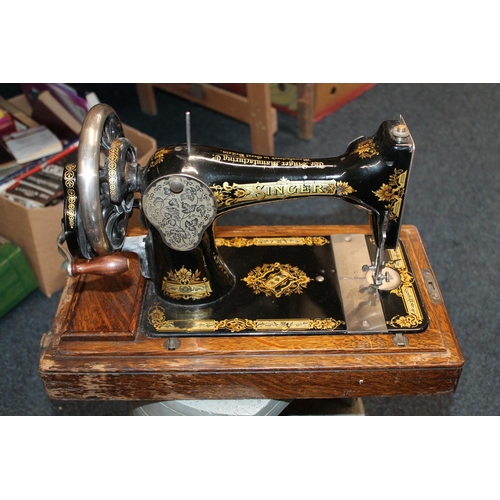 338A - Cased Singer sewing machine.