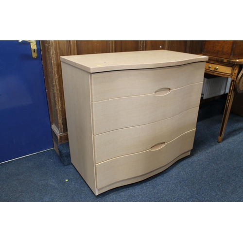 696 - Modern serpentine fronted chest of four drawers.