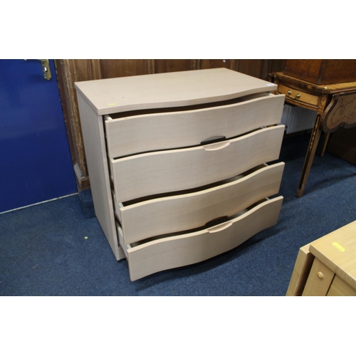 696 - Modern serpentine fronted chest of four drawers.