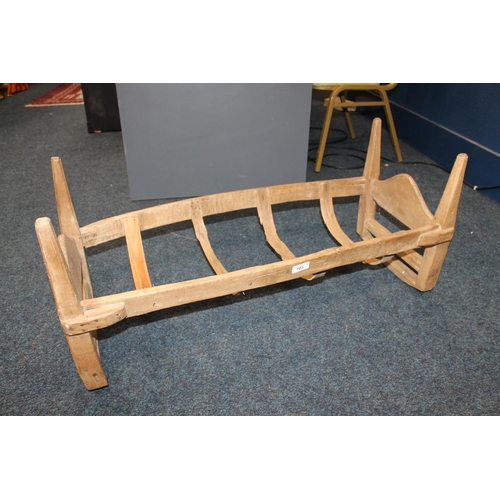 705 - Antique rustic rocker crib frame.