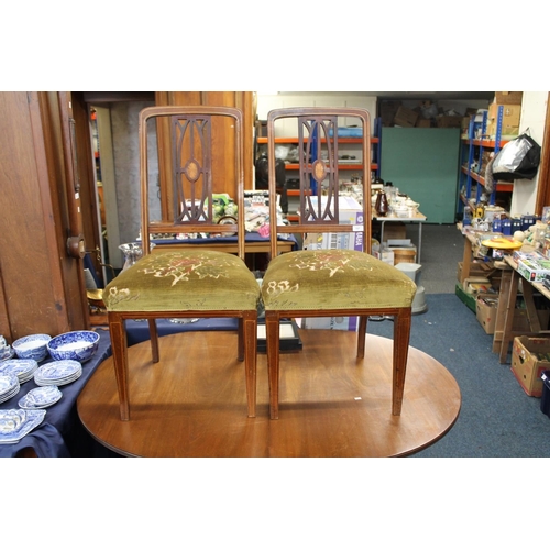 707 - Pair of Edwardian inlaid mahogany hall chairs.