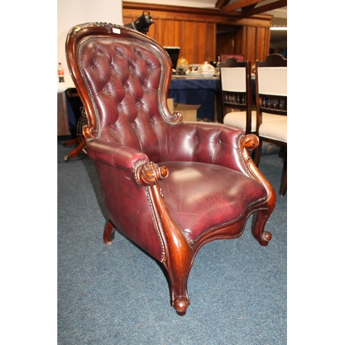 713 - Chesterfield style button back armchair.