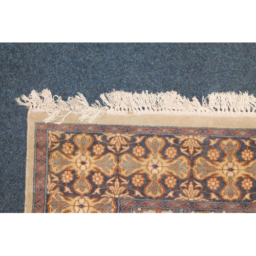 717 - Turkish beige rug, 186cm x 131cm.