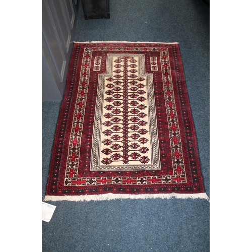 719 - Persian Balouch rug, 140cm x 101cm.