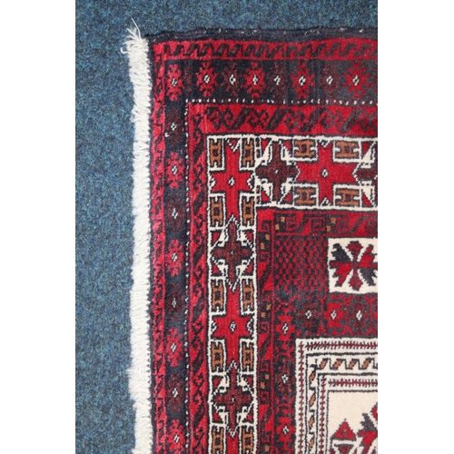 719 - Persian Balouch rug, 140cm x 101cm.