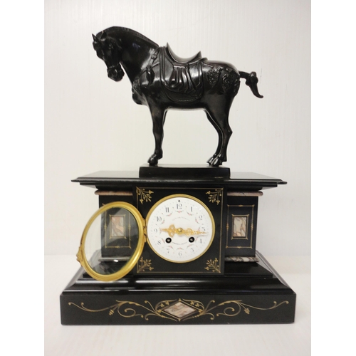 301 - French black slate, marble and bronze mantel clock, the bronze horse surmount above an enamel dial w... 