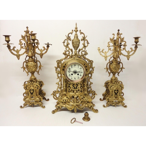 302 - French brass three-piece clock garniture in the Rococo taste, 20th century, comprising a large brack... 