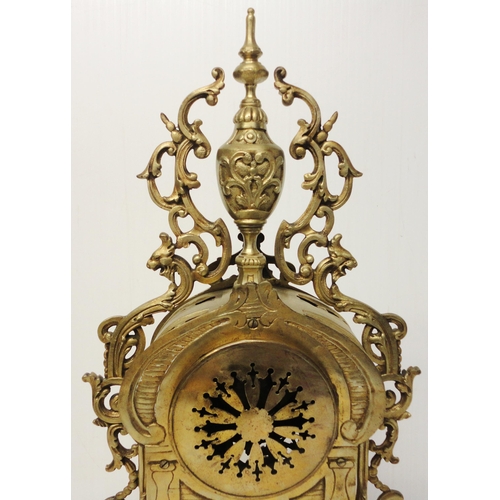 302 - French brass three-piece clock garniture in the Rococo taste, 20th century, comprising a large brack... 