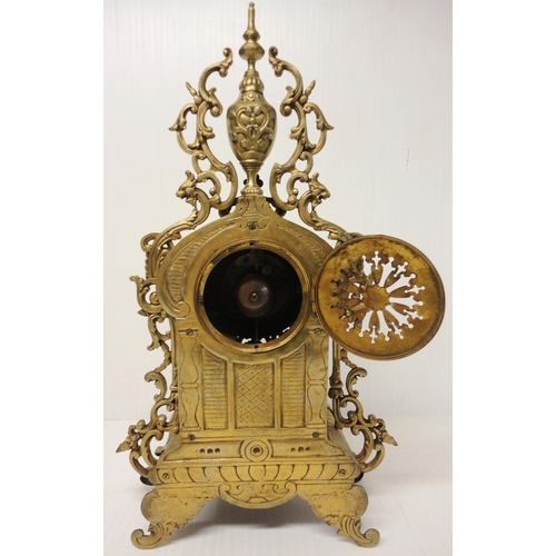 302 - French brass three-piece clock garniture in the Rococo taste, 20th century, comprising a large brack... 