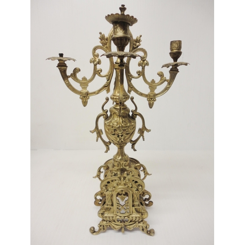 302 - French brass three-piece clock garniture in the Rococo taste, 20th century, comprising a large brack... 