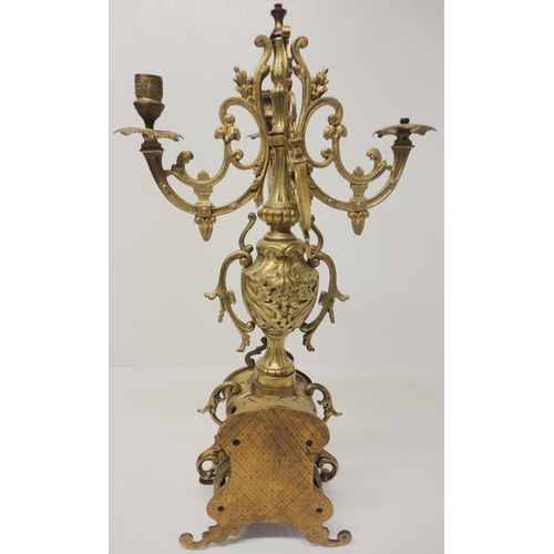 302 - French brass three-piece clock garniture in the Rococo taste, 20th century, comprising a large brack... 