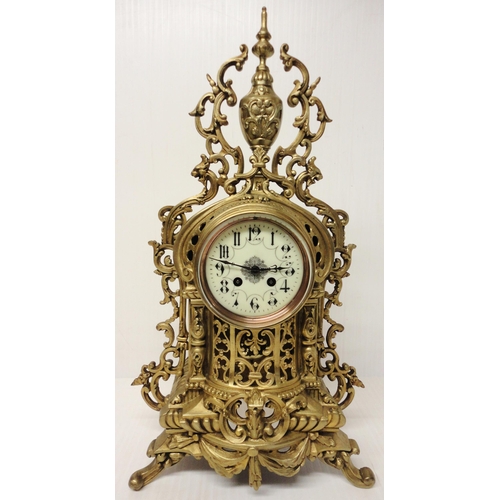 302 - French brass three-piece clock garniture in the Rococo taste, 20th century, comprising a large brack... 