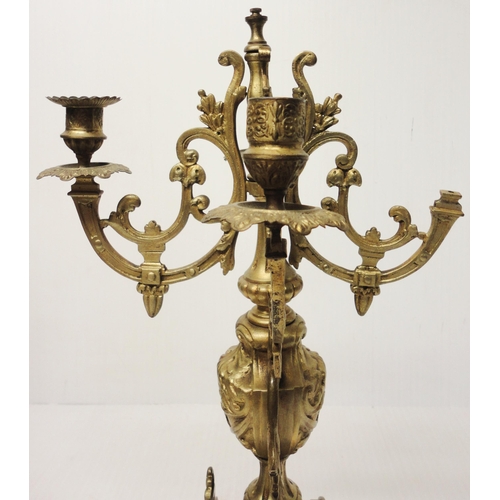 302 - French brass three-piece clock garniture in the Rococo taste, 20th century, comprising a large brack... 