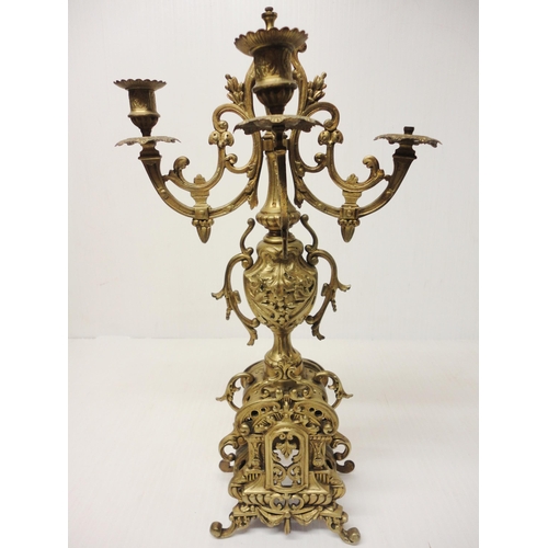 302 - French brass three-piece clock garniture in the Rococo taste, 20th century, comprising a large brack... 