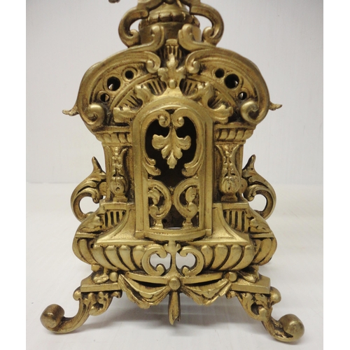 302 - French brass three-piece clock garniture in the Rococo taste, 20th century, comprising a large brack... 