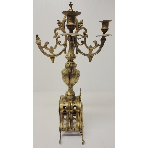 302 - French brass three-piece clock garniture in the Rococo taste, 20th century, comprising a large brack... 