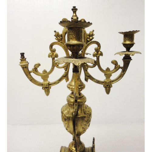 302 - French brass three-piece clock garniture in the Rococo taste, 20th century, comprising a large brack... 