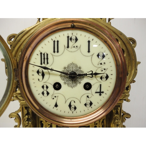 302 - French brass three-piece clock garniture in the Rococo taste, 20th century, comprising a large brack... 