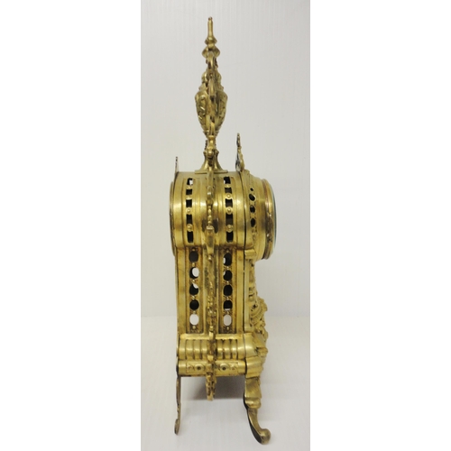 302 - French brass three-piece clock garniture in the Rococo taste, 20th century, comprising a large brack... 