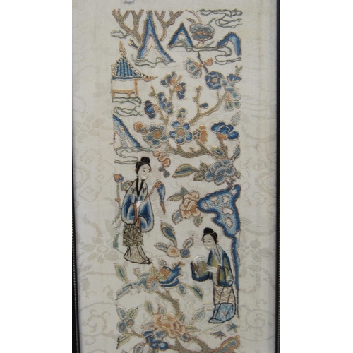 353 - Two framed Oriental sleeve panels, each 50cm x 9cm.  (2)